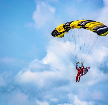 Photo of parachutist with American flag