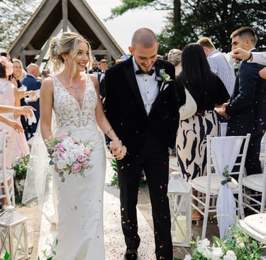 Bride and groom confetti photo at highley manor 