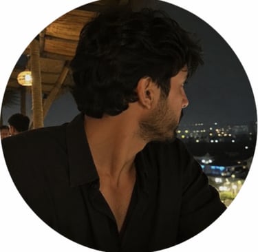 profile picture of a man at the beach during dusk