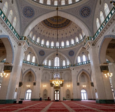 Students engaged in a lively online class, visible on laptop screens with focused expressions.