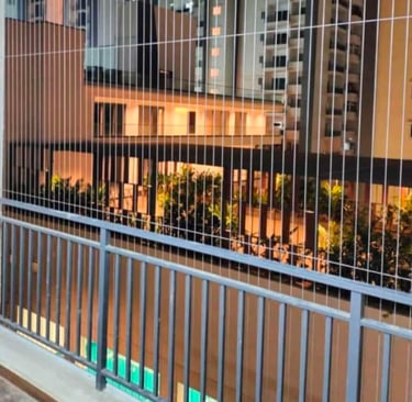 A rooftop with invisible grills blending seamlessly into the background, ensuring safety without blo