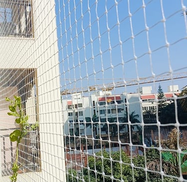 Pigeon net covering apartment balcony in Jogeshwari East