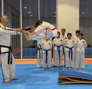 Master Carlos Bazan, ITF World Champion, teaching students Taekwon-Do in Dubai