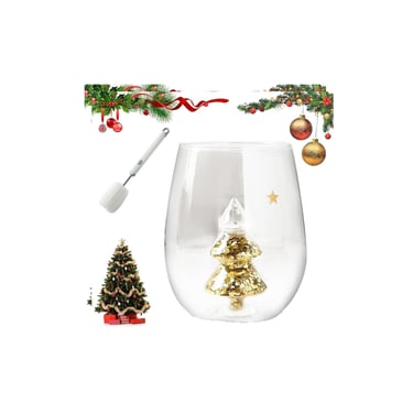 a glass of wine with a christmas tree in the background