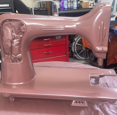 Vintage New home sewing machine from world war 2 era freshly painted for restoration.