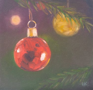 An original oil painting of a Christmas bauble and lights