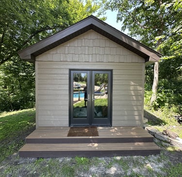 outdoor shed with fresh exterior painting in minnesota