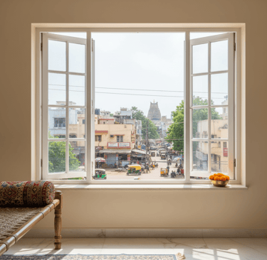 a window with a view of a city street