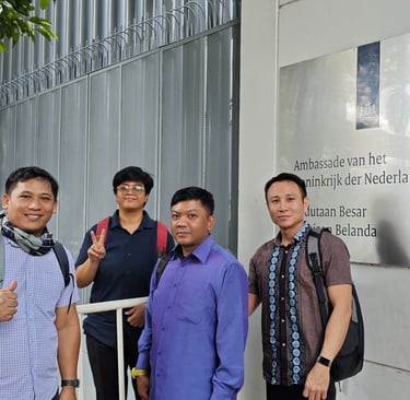 Crew standing in front of the Embassy of the Kingdom of the Netherlands in Jakarta, after visa app.