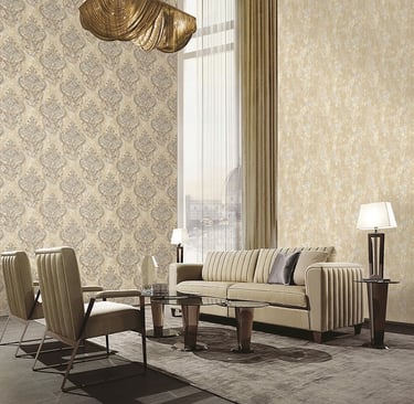 Elegant living room featuring luxury damask wallpaper, a modern beige sofa, and gold chandeliers.