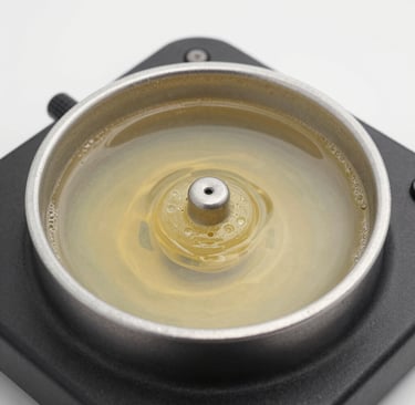 clear glass jar with brown liquid