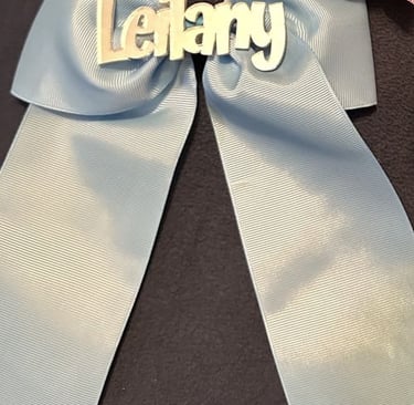 Moño de grosgrán azul claro personalizado con el nombre