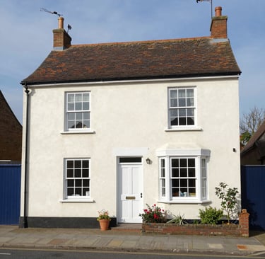 Child walks through a space-themed playground tunnel at play area