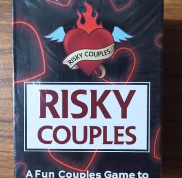 Boxed couples card game titled Risky Couples designed for playful adult game nights