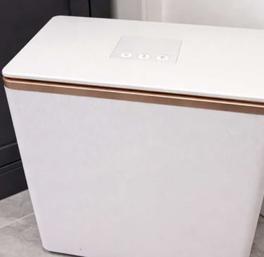 SereneLife towel warmer stands in a modern bathroom corner, displaying its compact and sleek design.