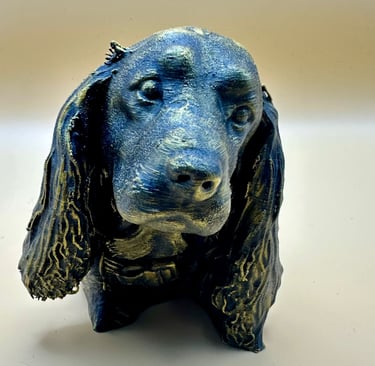 Metallic blue and gold 3D-printed Cocker Spaniel dog statue, showcasing intricate texture and artistic design for home decor.