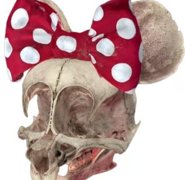 Anatomical mini mouse skull wearing a red and white polka dot bow in a gothic art style.