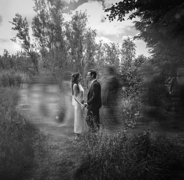 bride and groom walking toward each other in the countryside