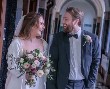 Newly-weds leaving the ceremony room