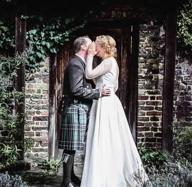 bride whispering to groom