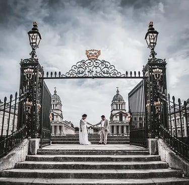 wedding couple standing on the old royal navy college steps in greenwich
