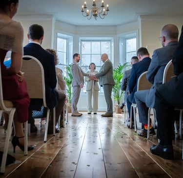 two grooms being married at their ceremony in Pembroke Lodge Richmond