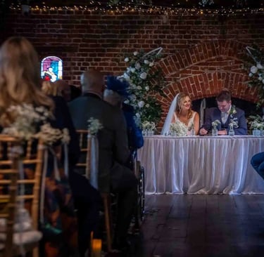 Wedding register signing at Tudor Barn Eltham