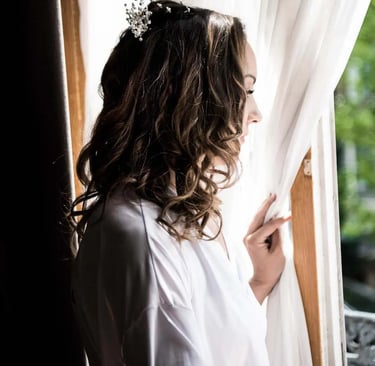 bride looking out of a window