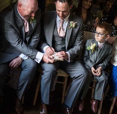best man trying to find the wedding rings at the ceremony