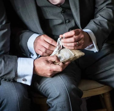 best man trying to find the wedding rings at the ceremony