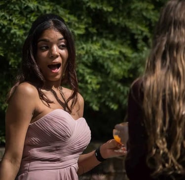 bridesmaid smiling after the wedding ceremony