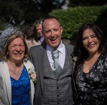Groom at his wedding with friends