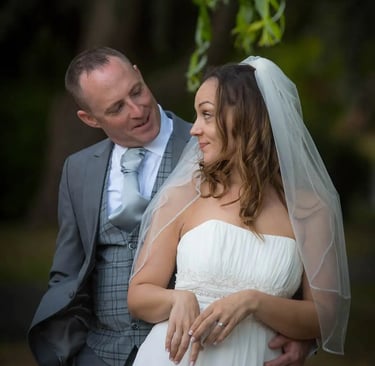 newly-weds having a walk around the grounds of Tudor Barn Eltham