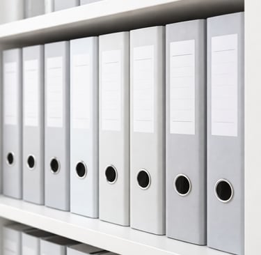 Folder cabinet filled with grey folders