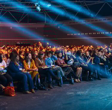 Large audience seated in a conference hall