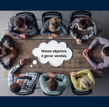 a group of people sitting around a table with a thought bubble
