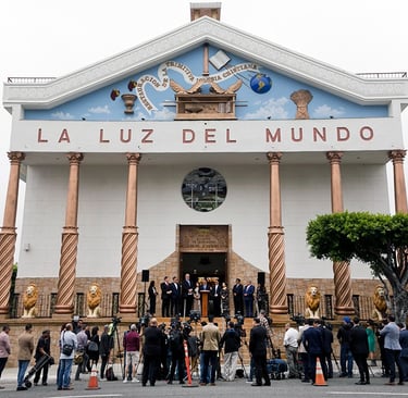 Press conference outside La Luz del Mundo temple with reporters and news cameras.