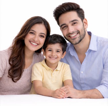 A happy young family with a smiling father, mother, and small son posing together on a white background.