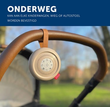 Zazu Suzy Brown Deluxe met automatische huilsensor onderweg aan een kinderwagen