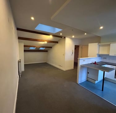 a kitchen with a stove top oven and a stove top