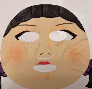 A moisturizing mask for skin care featuring a printed design of right light and green light