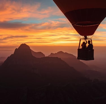couple on romantic sunrise hot air balloon ride