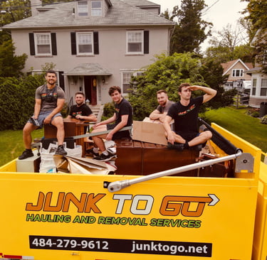 Junk To Go hauling crew and truck in Montgomery County.