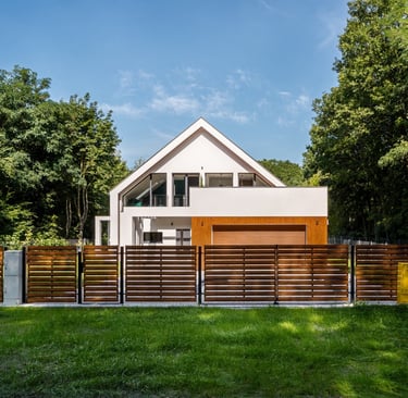 House and neighbour's garden separated by a fence