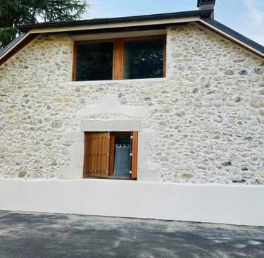 a house with a large window and a door