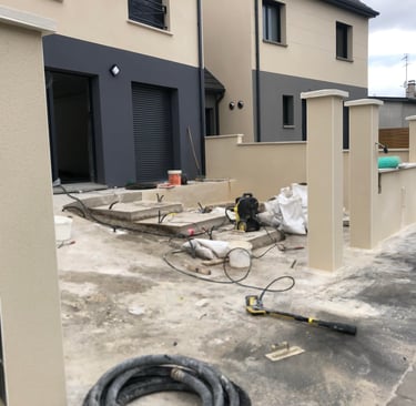 a house with a hose and a hose in the yard