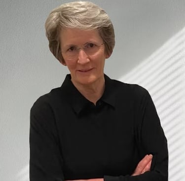 Image of the General Manager | Producer against a light gray wall
