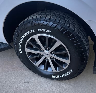 Auto detailing in Logan OH with freshly dressed tires and clean wheels