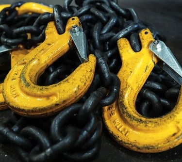 chain sling and hooks being inspected