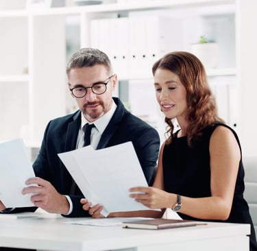 Inventor reviewing patent application documents marked Patent Pending